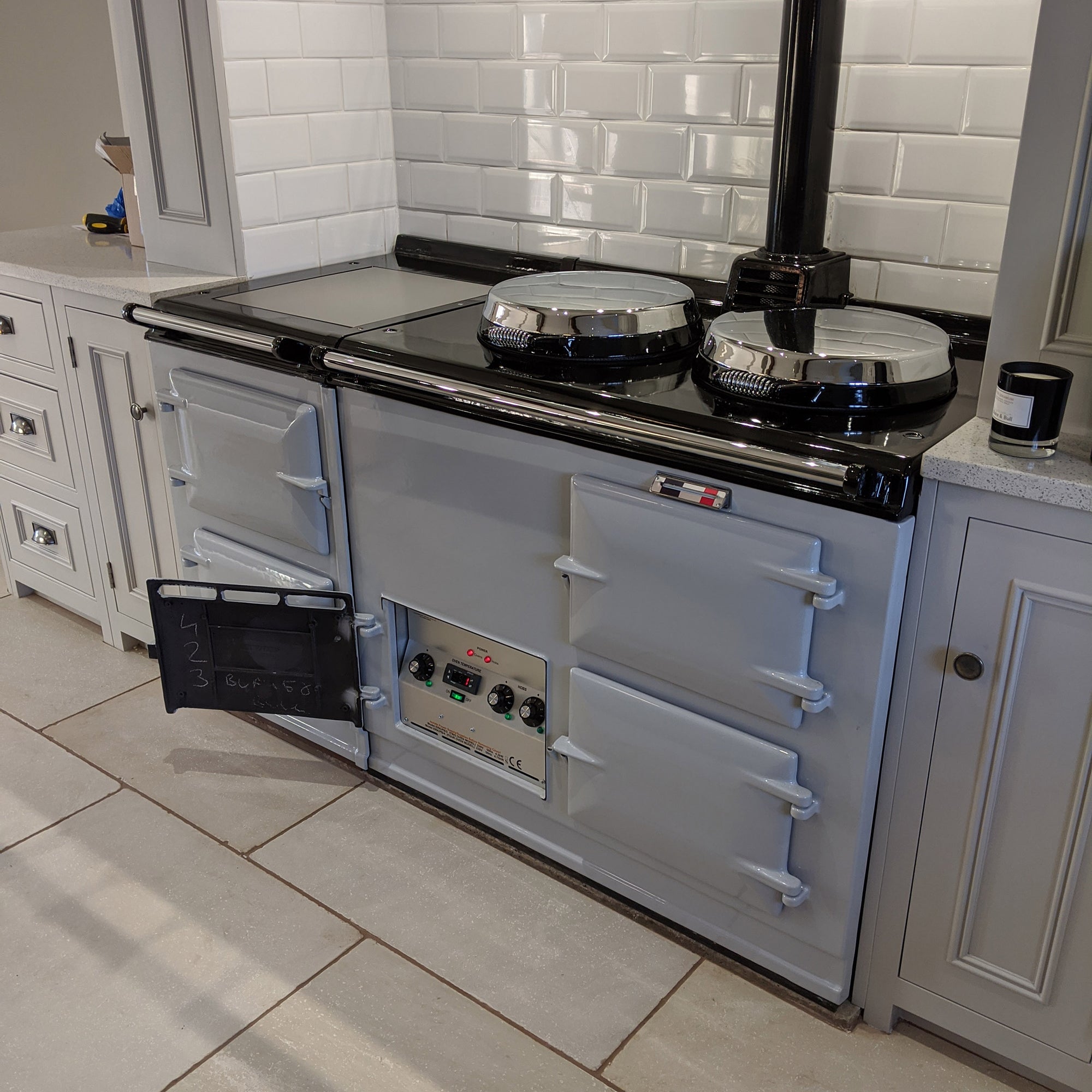 A light grey 'eCook' reconditioned Aga range cooker installation
