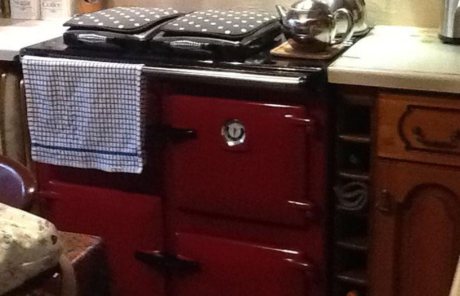 Red Rayburn range cooker with our Dotty hob covers!