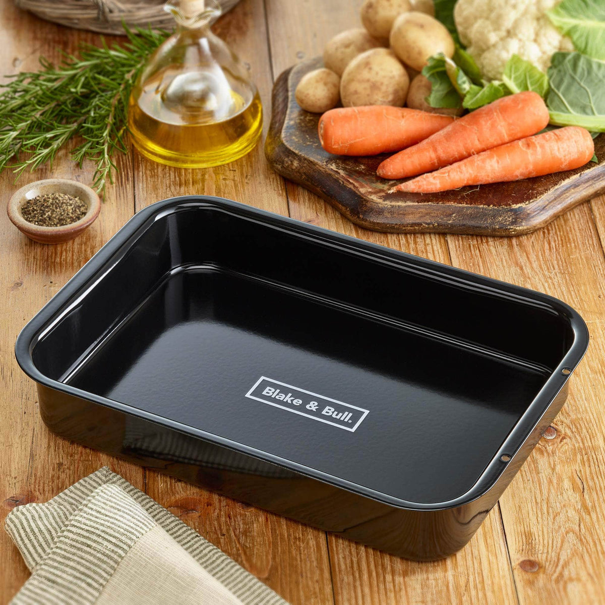 &#39;Fits on runners&#39; black enamelled roasting tin for use with Aga range cookers &#39;half oven&#39; size